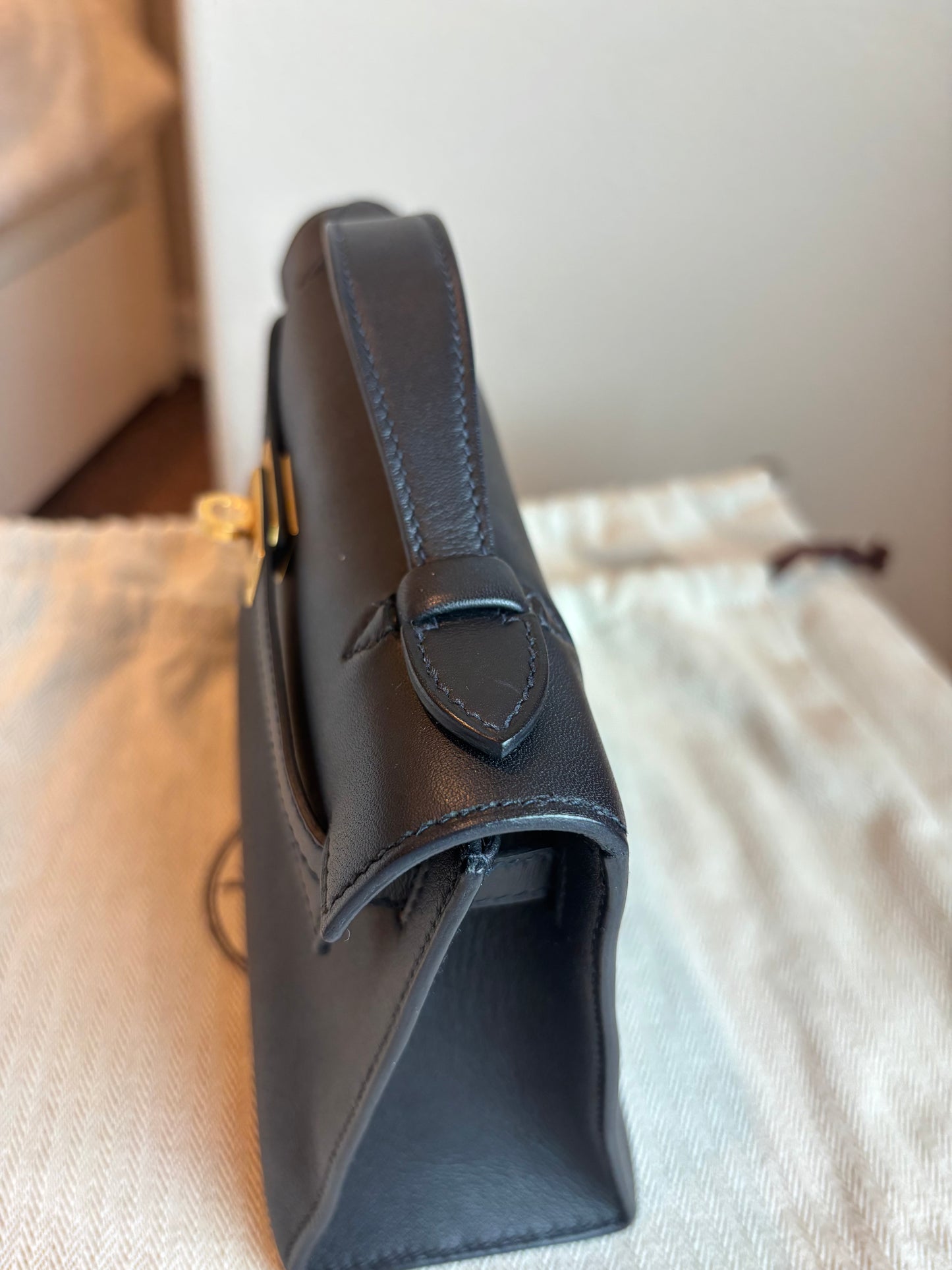 Kelly Pochette Swift Black GHW